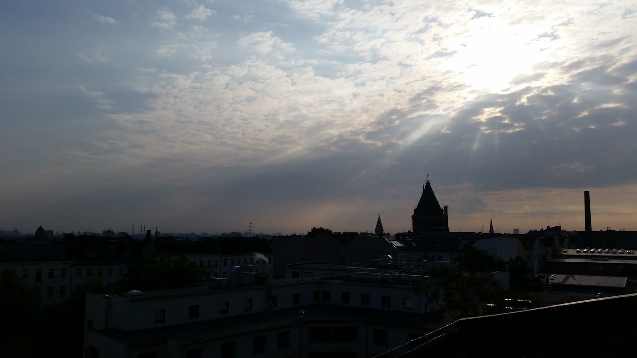 building exterior, architecture, built structure, sky, sunset, cloud - sky, city, cityscape, silhouette, cloudy, residential building, dusk, high angle view, residential structure, residential district, cloud, outdoors, no people, house, building