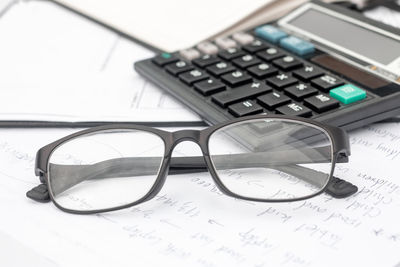 Close-up of eyeglasses on table