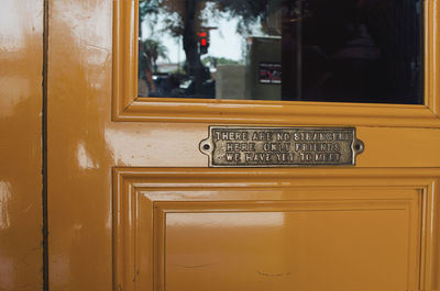 Close-up of text on door