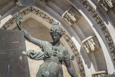 Low angle view of statue of historic building