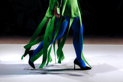 Low section of woman standing on floor
