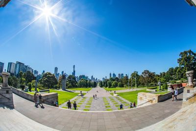 Panoramic view of people on sunny day