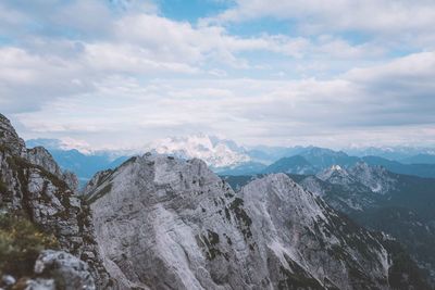 Scenic view of snowcapped mountains against sky