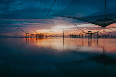 Scenic view of sea against sky at sunset