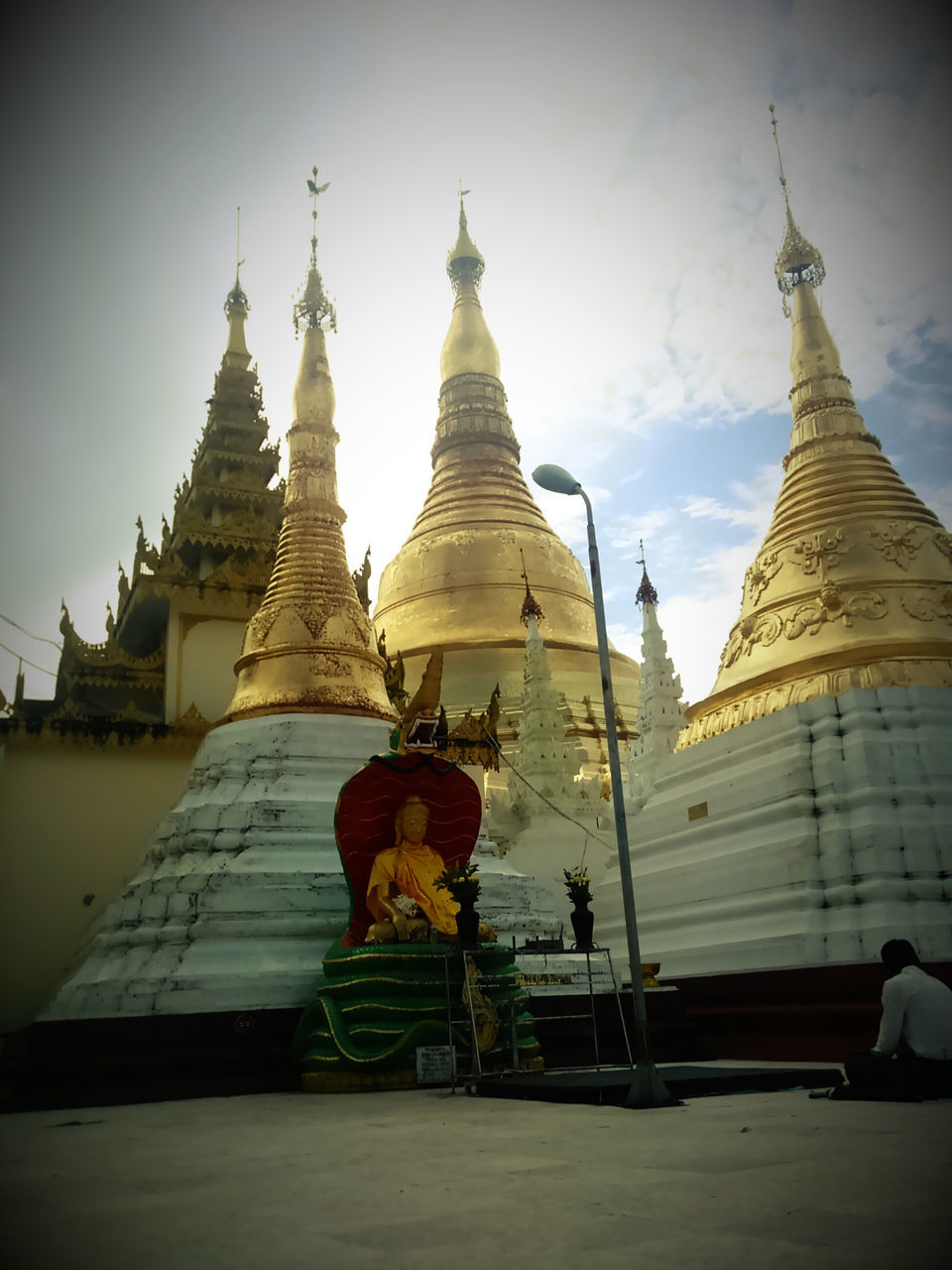 religion, place of worship, architecture, built structure, building exterior, spirituality, sky, temple - building, famous place, history, low angle view, travel destinations, church, tourism, statue, travel, sculpture