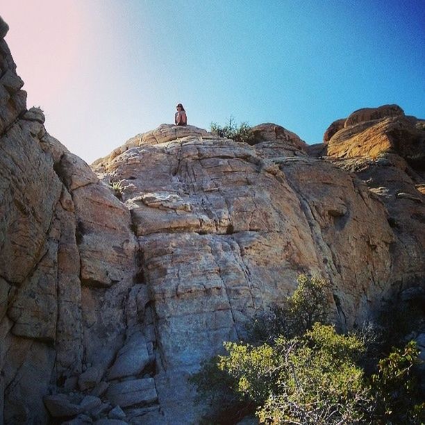 rock formation, rock - object, clear sky, tranquility, tranquil scene, cliff, mountain, scenics, nature, beauty in nature, rock, rocky mountains, geology, physical geography, low angle view, sunlight, eroded, non-urban scene, rocky