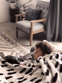 Man sleeping on sofa at home