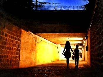 Full length of woman in tunnel