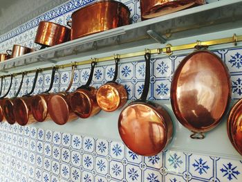 Copper utensils on wall