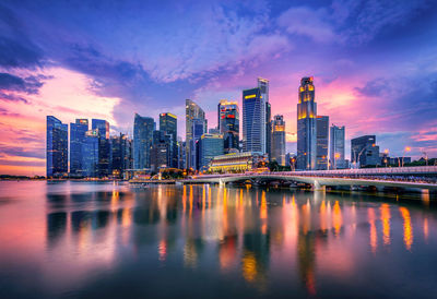 Illuminated buildings in city at night