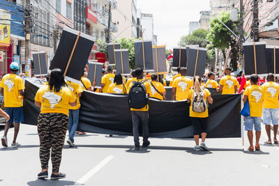 Protester carries a poster during a demonstration against president jair bolsonaro 