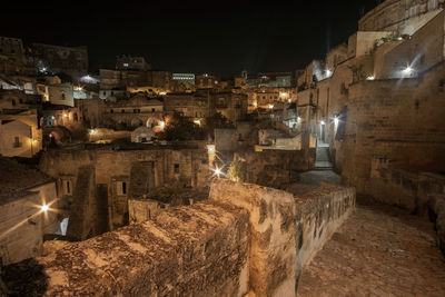 High angle view of illuminated buildings at night