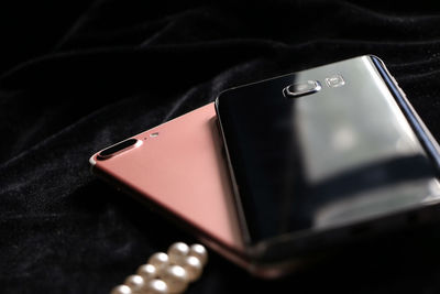 Close-up of mobile phone on table