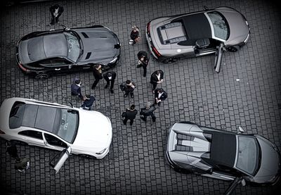 High angle view of people standing on street