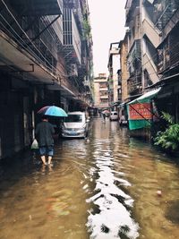 View of canal in city