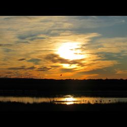 Scenic view of dramatic sky during sunset