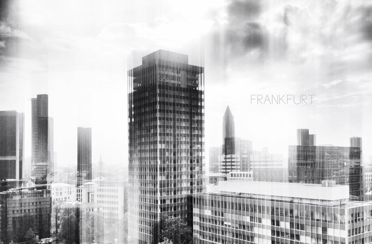 LOW ANGLE VIEW OF MODERN BUILDINGS AGAINST SKY