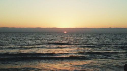 Scenic view of sea during sunset