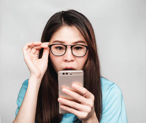 Young woman using mobile phone