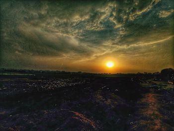 Scenic view of landscape against sky during sunset