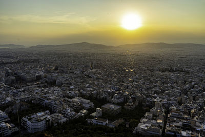 High angle view of townscape against sky during sunset