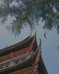 Low angle view of traditional building against sky