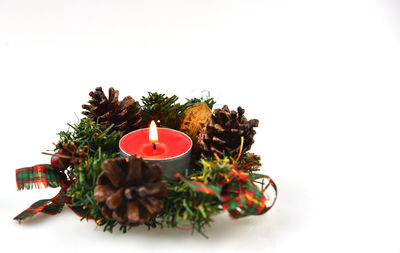 Close-up of christmas decoration against white background