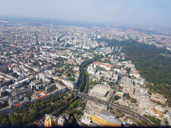 High angle view of city buildings against sky