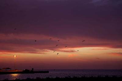 Scenic view of sea at sunset