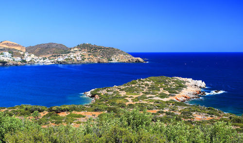 Scenic view of calm sea against clear sky