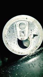 Close-up of water drops on metal