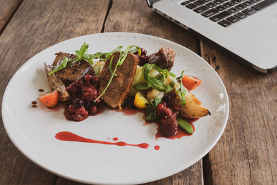 High angle view of salad in plate on table