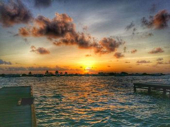 Scenic view of sea at sunset