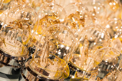 Close-up of golden glass sculptures