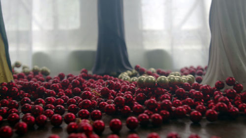 Close-up of pink pearls on table