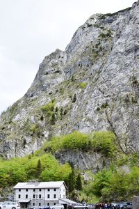 Low angle view of rock formations against sky