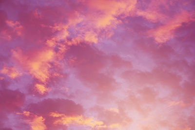 Low angle view of dramatic sky during sunset