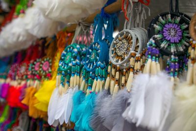 Close-up of colorful dreamcatchers for sale in market