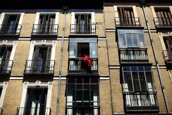 LOW ANGLE VIEW OF RESIDENTIAL BUILDING