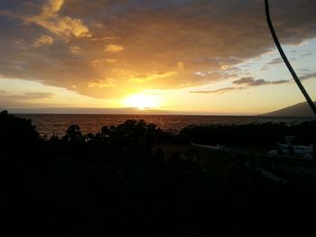 Scenic view of sea at sunset