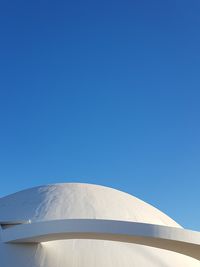 Low angle view of building against blue sky