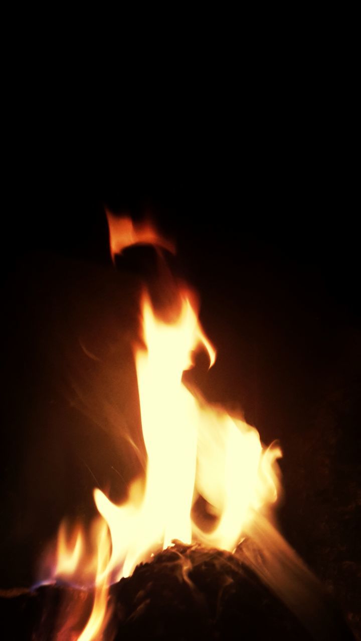 burning, flame, fire - natural phenomenon, heat - temperature, bonfire, glowing, fire, night, heat, firewood, campfire, illuminated, dark, close-up, candle, light - natural phenomenon, danger, orange color, motion, copy space