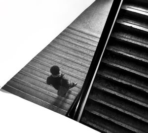 High angle view of boy on steps