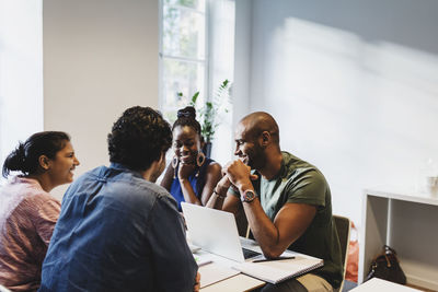 Group of people sitting at table