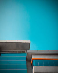 Low angle view of building against blue sky