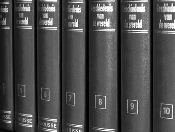 Close-up of books on shelf