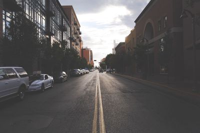 Cars on road in city