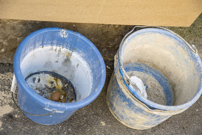 High angle view of metal container on table