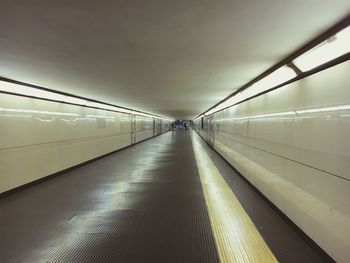 Rear view of illuminated tunnel