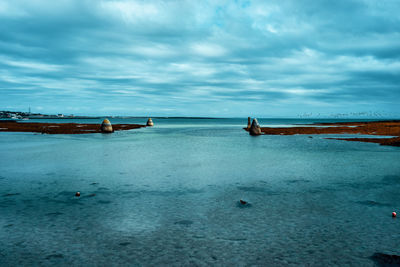 Scenic view of the old harbour of inishmore during low tide